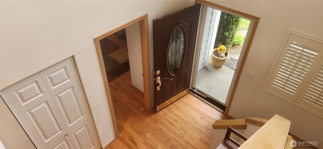 foyer entrance featuring light wood-style flooring