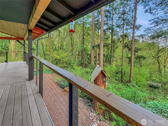 deck with a wooded view