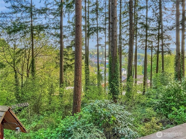 view of landscape featuring a view of trees