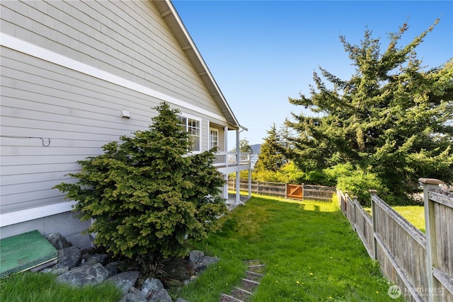 view of yard with a fenced backyard