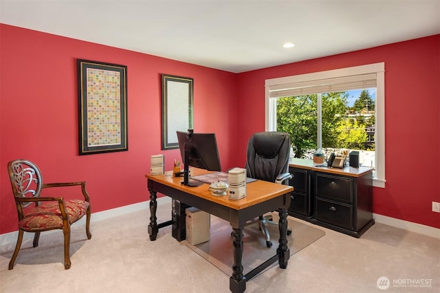 home office featuring baseboards, recessed lighting, and light carpet