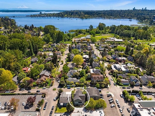 aerial view featuring a residential view and a water view