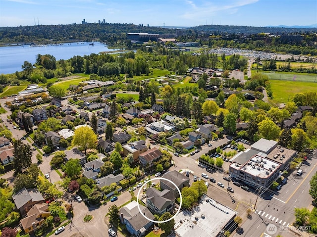 aerial view with a water view and a residential view