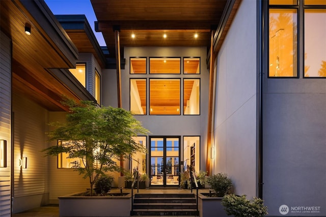 209 Northside Rd, Bellevue, WA 98004 - back of house with stucco siding and french doors