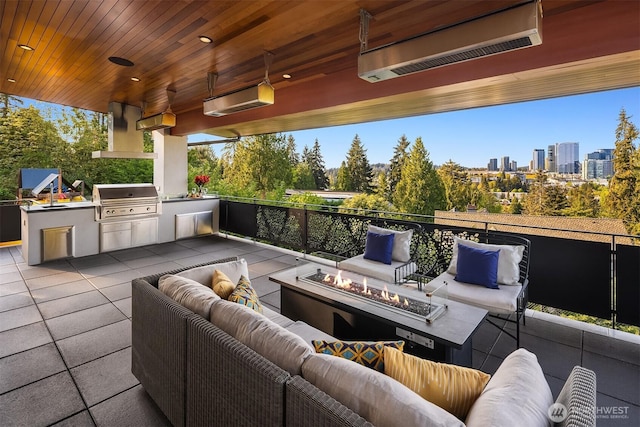 209 Northside Rd, Bellevue, WA 98004 - view of patio with area for grilling, an outdoor living space with a fire pit, and an outdoor kitchen