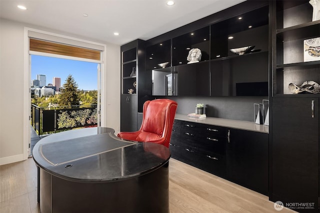 209 Northside Rd, Bellevue, WA 98004 - home office featuring light wood-type flooring, recessed lighting, and baseboards
