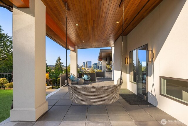 209 Northside Rd, Bellevue, WA 98004 - view of patio / terrace featuring an outdoor hangout area and a view of city