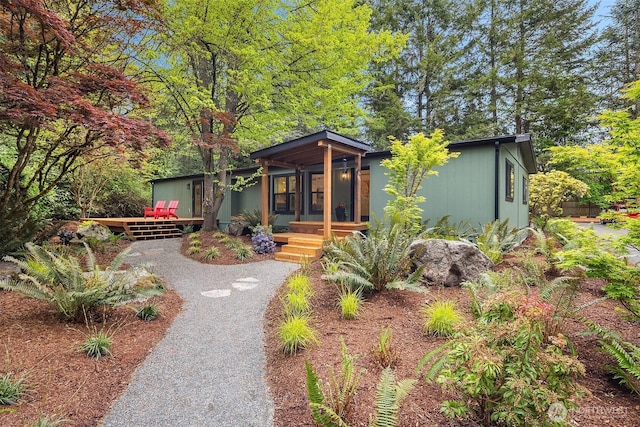 view of front of property featuring a deck