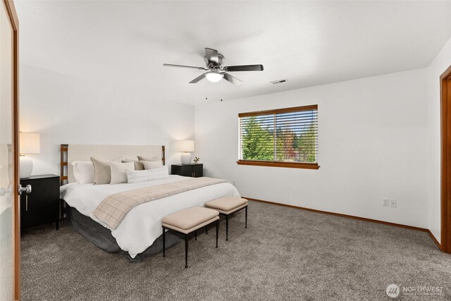 bedroom with baseboards, a ceiling fan, carpet flooring, and visible vents