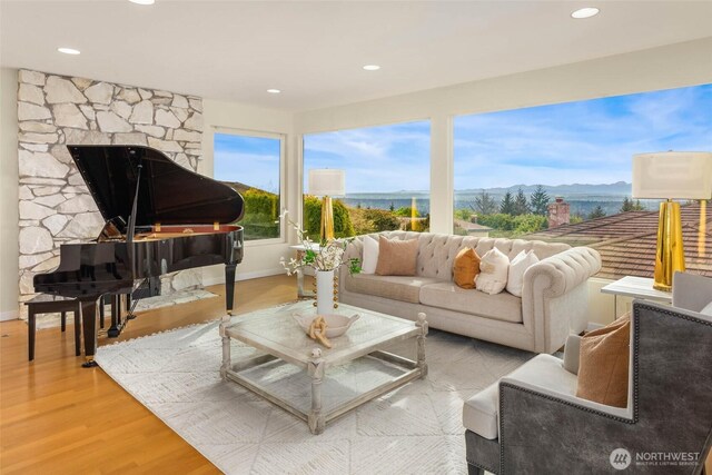 5310 143rd Ave SE, Bellevue, WA 98006 - living area featuring wood finished floors, recessed lighting, a mountain view, and baseboards