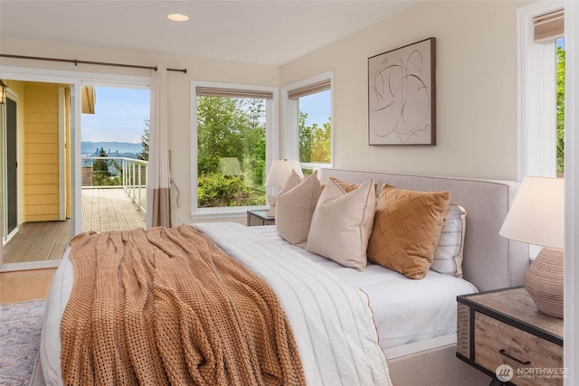 5310 143rd Ave SE, Bellevue, WA 98006 - bedroom with access to exterior, multiple windows, and recessed lighting