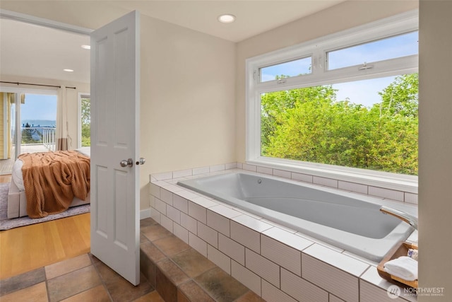 5310 143rd Ave SE, Bellevue, WA 98006 - ensuite bathroom featuring plenty of natural light, a bath, recessed lighting, and baseboards