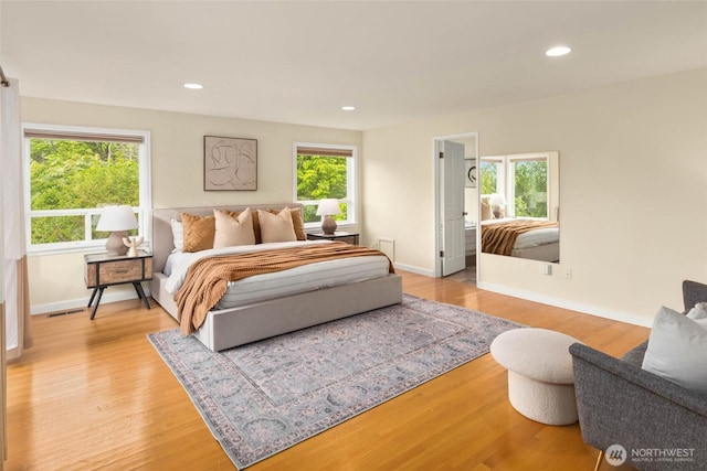 5310 143rd Ave SE, Bellevue, WA 98006 - bedroom featuring baseboards, light wood-type flooring, and recessed lighting