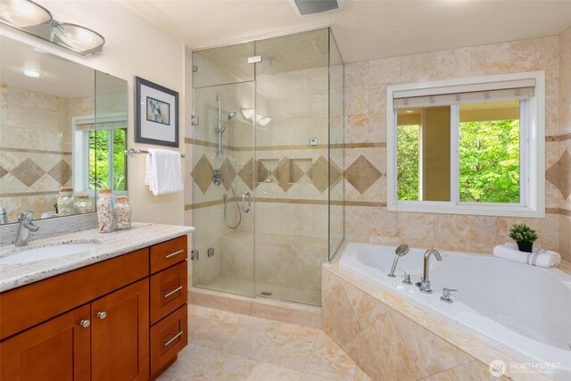 5310 143rd Ave SE, Bellevue, WA 98006 - full bath with a shower stall, vanity, a garden tub, plenty of natural light, and tile walls