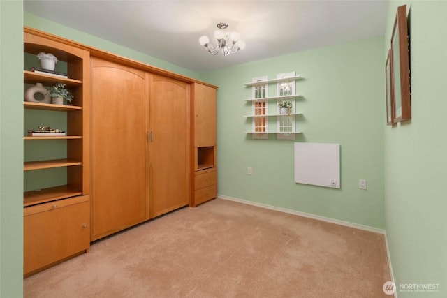 5310 143rd Ave SE, Bellevue, WA 98006 - unfurnished bedroom with a chandelier, light carpet, and baseboards