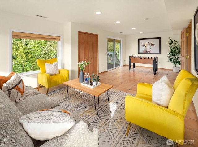 5310 143rd Ave SE, Bellevue, WA 98006 - living room with light tile patterned floors, recessed lighting, and baseboards