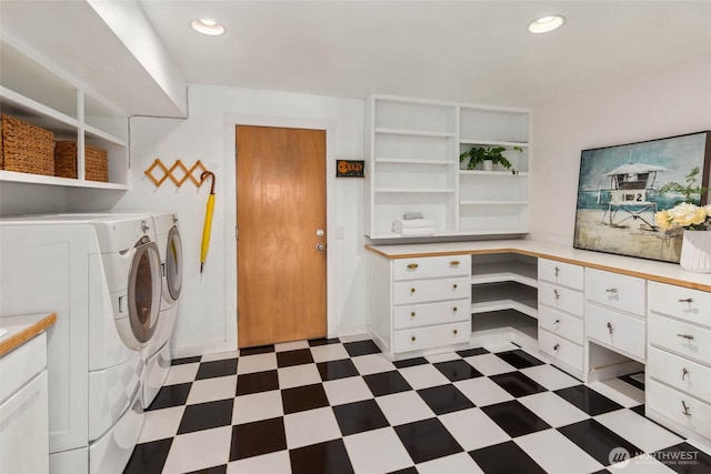 5310 143rd Ave SE, Bellevue, WA 98006 - washroom featuring dark flooring, washing machine and clothes dryer, a desk, and recessed lighting