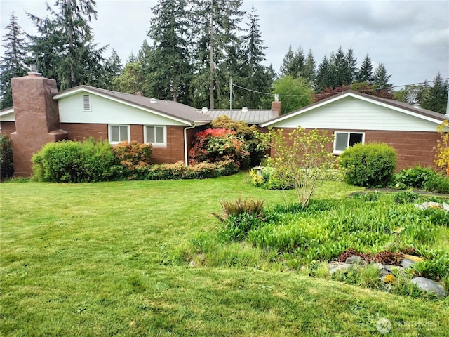 21926 Vashon Hwy SW, Vashon, WA 98070 - view of side of property featuring a chimney and a yard