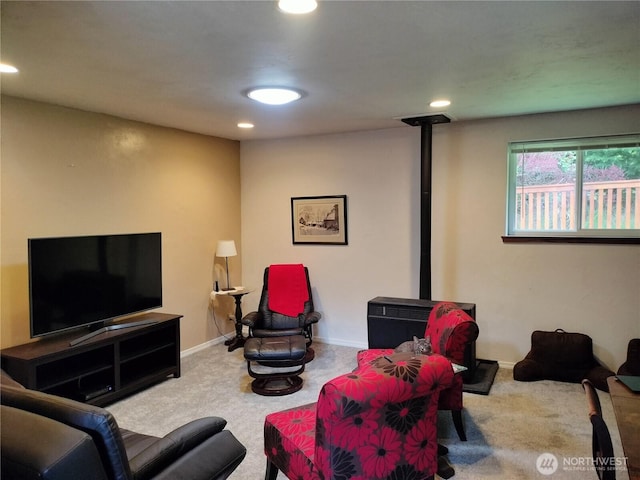 21926 Vashon Hwy SW, Vashon, WA 98070 - carpeted living area featuring recessed lighting, a wood stove, and baseboards