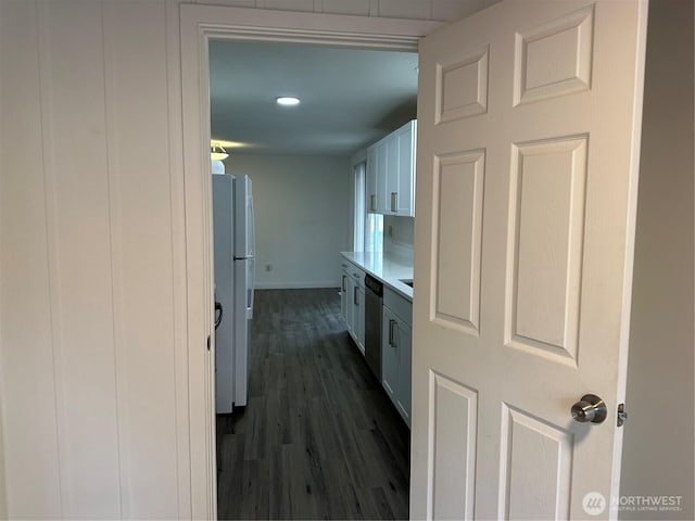 1615 S 90th St, Tacoma, WA 98444 - kitchen with dishwasher, light countertops, freestanding refrigerator, baseboards, and dark wood-style floors