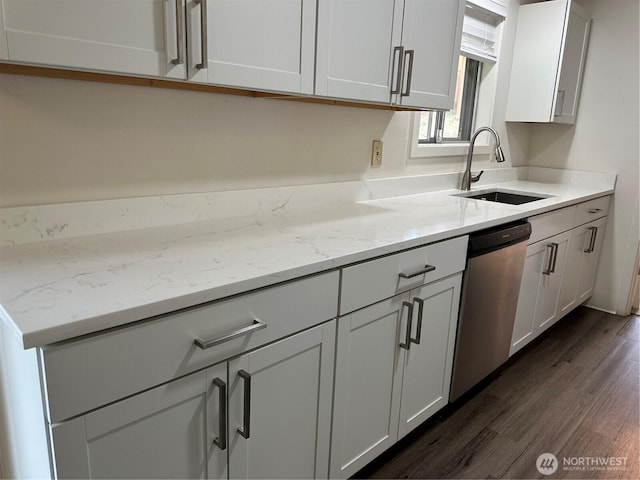 1615 S 90th St, Tacoma, WA 98444 - kitchen featuring light stone countertops, dark wood-style floors, white cabinetry, a sink, and dishwasher