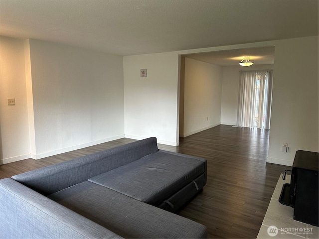 1615 S 90th St, Tacoma, WA 98444 - living room with baseboards and dark wood finished floors