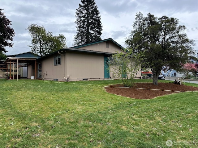 1615 S 90th St, Tacoma, WA 98444 - view of home's exterior with a lawn