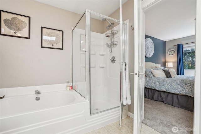 bathroom featuring connected bathroom, a shower stall, tile patterned flooring, and a bath