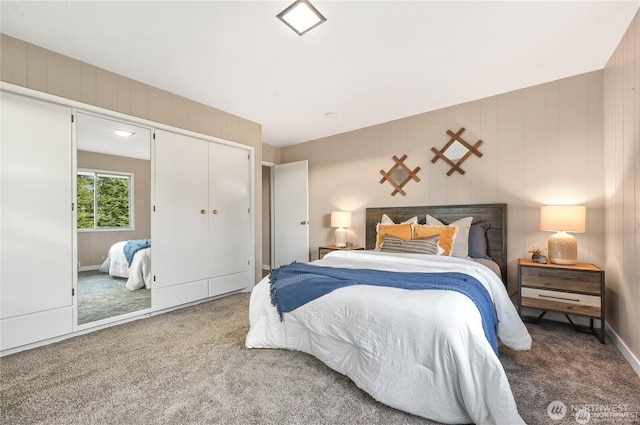 bedroom with a closet and carpet flooring