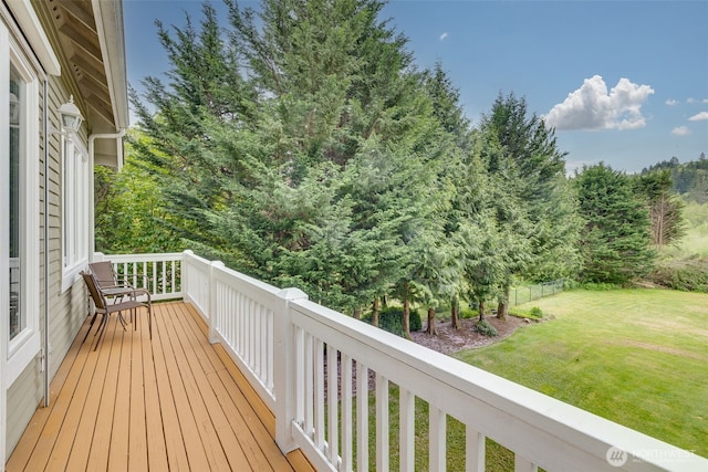 deck featuring a lawn
