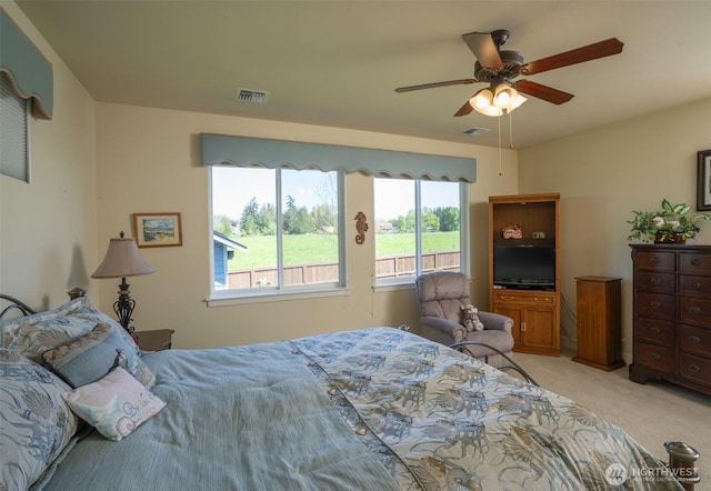 71 Lillian Ridge Dr, Sequim, WA 98382 - bedroom with visible vents, multiple windows, and light colored carpet