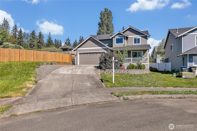 craftsman inspired home with driveway, a garage, and a porch