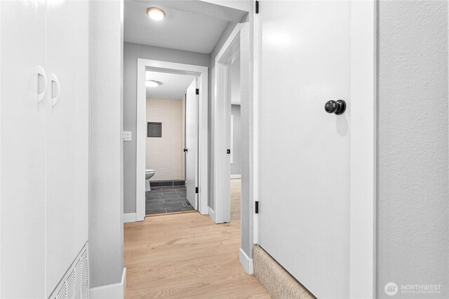 hall featuring light wood finished floors