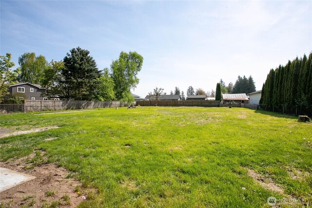 view of yard with fence