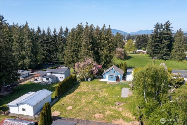 drone / aerial view featuring a mountain view