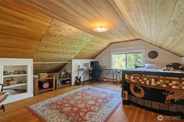 bedroom featuring wood finished floors, vaulted ceiling, and wooden ceiling