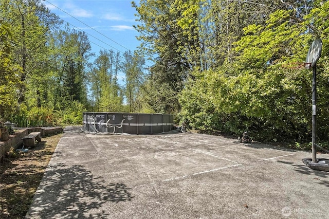 surrounding community featuring a pool