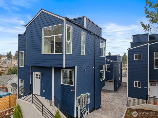 9751 57th Ave S, Seattle, WA 98118 - modern home with fence