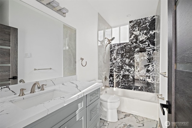 bathroom featuring shower / bath combination, vanity, toilet, and marble finish floor