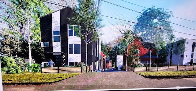 view of front of home with fence