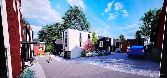 view of side of property with a residential view