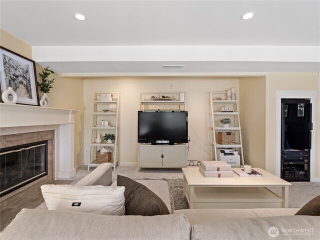 17111 NE 5th St, Bellevue, WA 98008 - living room featuring a tile fireplace, recessed lighting, light carpet, and baseboards