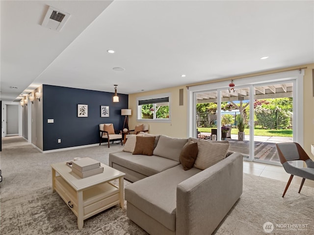 17111 NE 5th St, Bellevue, WA 98008 - living area featuring light colored carpet, recessed lighting, and baseboards
