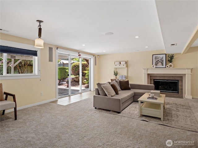 17111 NE 5th St, Bellevue, WA 98008 - carpeted living area featuring healthy amount of natural light, a fireplace with flush hearth, baseboards, and recessed lighting