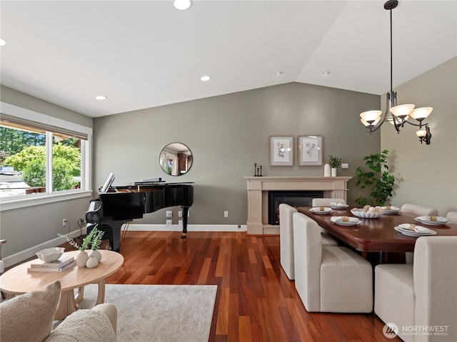 17111 NE 5th St, Bellevue, WA 98008 - dining room with wood finished floors, recessed lighting, vaulted ceiling, baseboards, and a chandelier