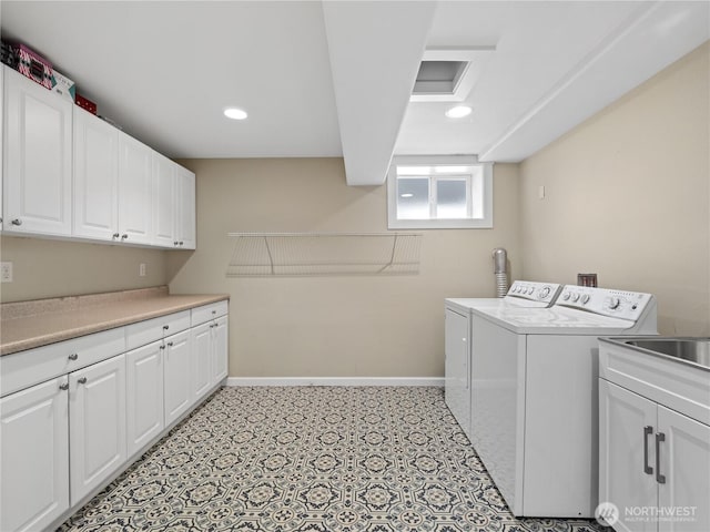 17111 NE 5th St, Bellevue, WA 98008 - laundry area featuring washing machine and clothes dryer, cabinet space, baseboards, and recessed lighting