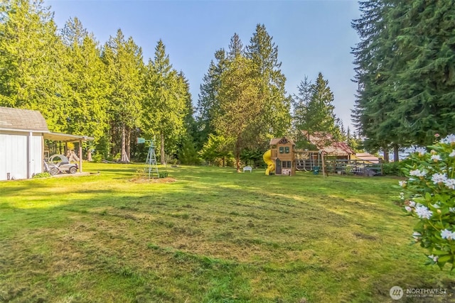view of yard featuring a playground