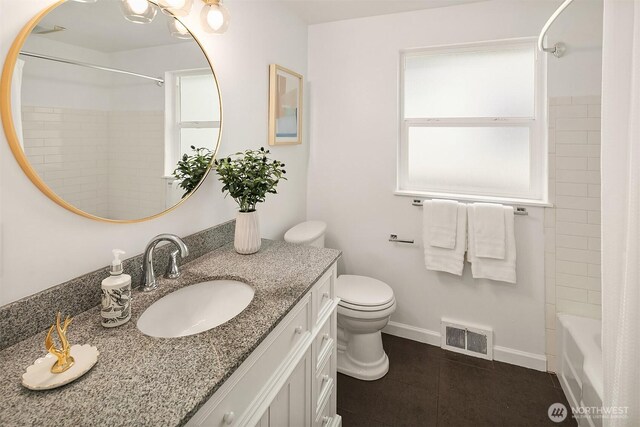 full bathroom featuring tile patterned flooring, visible vents, vanity, toilet, and baseboards