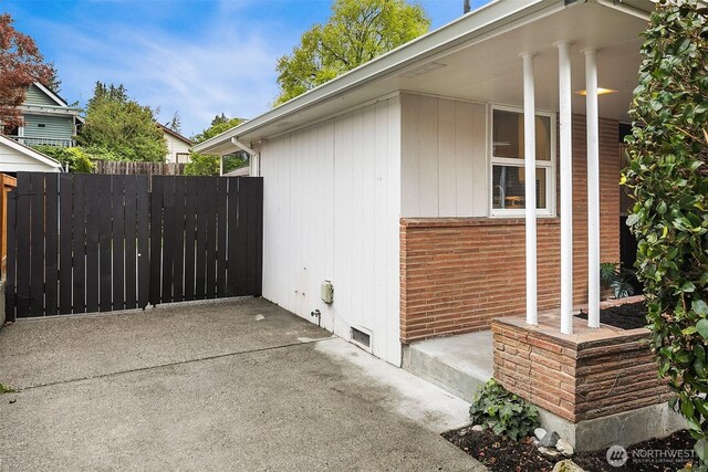 view of property exterior with fence