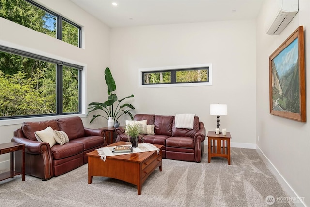 living room featuring light colored carpet, recessed lighting, baseboards, and a wall unit AC